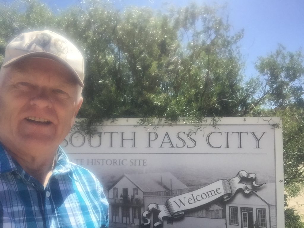 photo of Jim at South Pass City sign